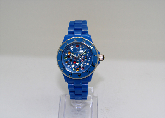 Les dames de plastique bleues de temps GLACENT le silicone de montres avec le diamant sur le cadran